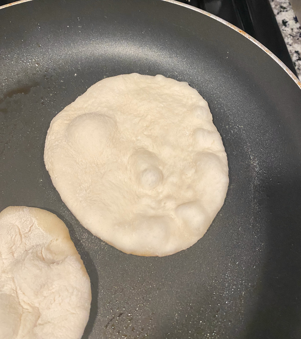 The pita with a little fluff in the pan